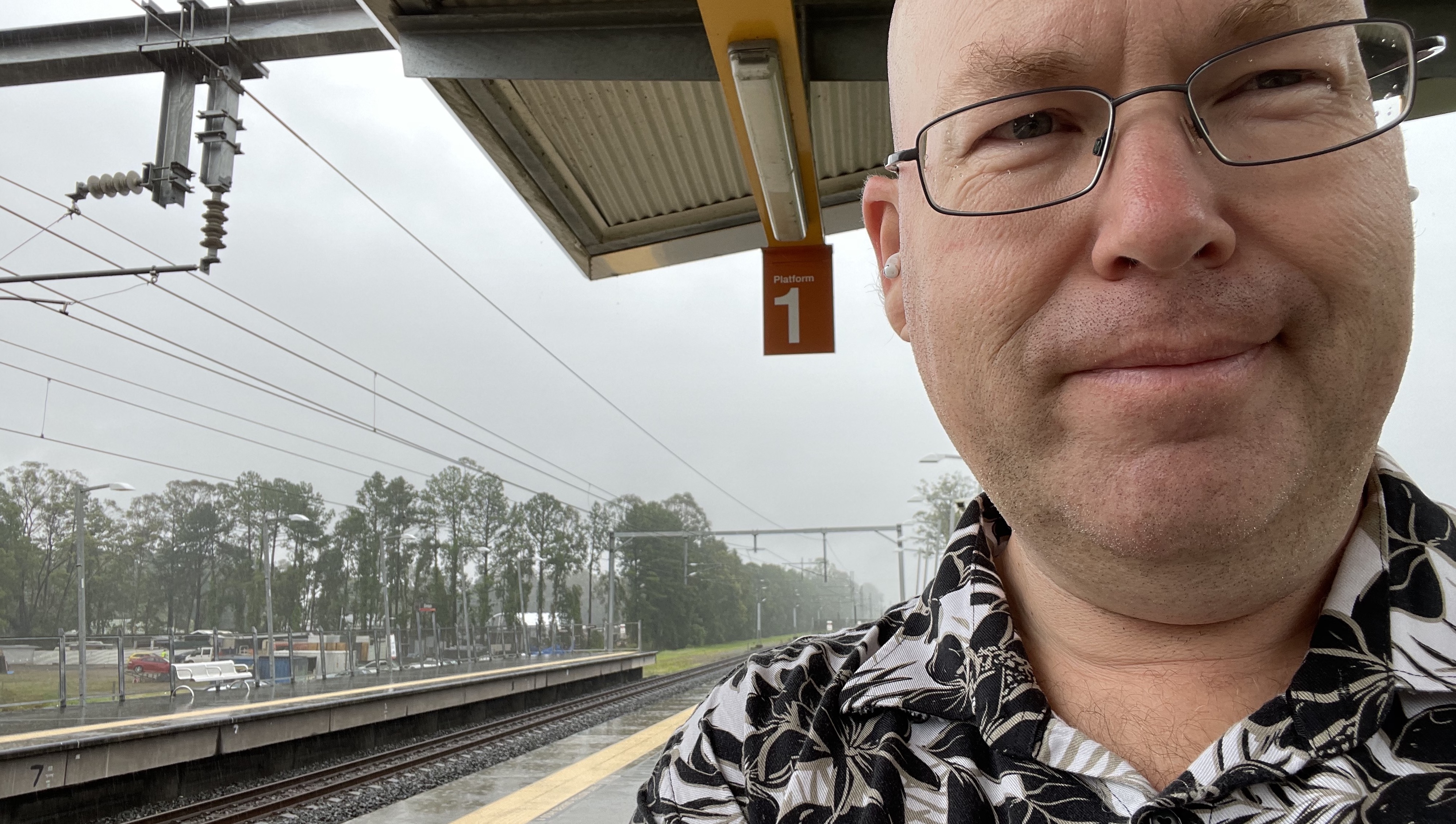 Waiting for the Train in the rain